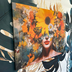 Tablou canvas femeie cu flori colorate galben si portocaliu in cap