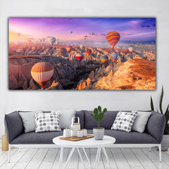 Tablou canvas peisaj Cappadocia Turcia canion plin de baloane cu aer cald la apusul soarelui