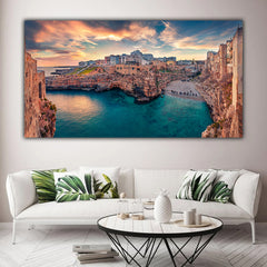 Tablou canvas peisajul orasului Puglia Italia pe malul marii la apus de soare